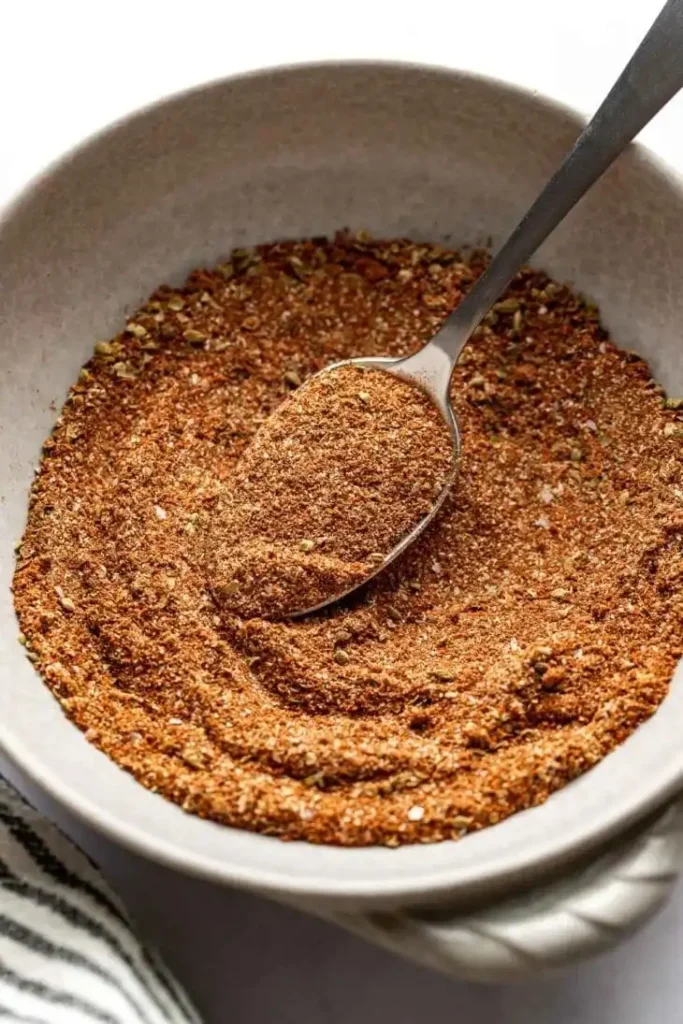 Simple Homemade Taco Seasoning Recipe Ready in 5 Minutes
Taco night gets a whole lot better when you skip the store-bought packets and make your own Homemade Taco Seasoning Recipe from scratch. With a simple blend of everyday spices, you can create a seasoning mix that's richer, fresher, and far more flavorful than anything you'll find on a grocery store shelf. The best part? It takes less than 5 minutes to make and uses ingredients you likely already have sitting in your pantry.
Whether you're seasoning ground beef, chicken, turkey, steak, or even roasted vegetables, this homemade taco seasoning delivers the perfect balance of smoky, savory, and slightly spicy flavors. Once you try it, you'll never want to buy pre-made taco seasoning again.
Ready to Upgrade Your Taco Night?
Have you ever looked at the ingredients list on a taco seasoning packet and wondered why it contains so many additives and preservatives? Making your own taco seasoning gives you complete control over the flavor while keeping things simple and fresh.
This seasoning blend is incredibly versatile and works in everything from tacos and burritos to taco salads, nachos, and quesadillas. Plus, you can easily adjust the spice level to match your family's preferences.
Why You'll Love This Recipe
There are plenty of reasons to keep this homemade taco seasoning on hand:
Ready in less than 5 minutes
Uses common pantry spices
No artificial ingredients or preservatives
Easy to customize
More affordable than store-bought packets
Perfect for beef, chicken, pork, and vegetables
Stores well for future meals
Once you make a batch, you'll find yourself reaching for it again and again.
Ingredients
For the Taco Seasoning Blend
1 tablespoon chili powder
2 teaspoons paprika
1 teaspoon ground cumin
1 teaspoon garlic powder
1 teaspoon onion powder
1 teaspoon dried oregano
½ teaspoon salt
½ teaspoon black pepper
¼ teaspoon crushed red pepper flakes (optional)
Each spice brings something special to the mix. Chili powder provides warmth and depth, cumin adds that classic taco flavor, and paprika contributes a subtle smoky note. Garlic and onion powders create a savory base while oregano adds an extra layer of flavor that ties everything together.
Instructions
Step 1: Combine the Spices
Add all the ingredients to a small mixing bowl.
Stir well until the spices are evenly distributed throughout the mixture.
Step 2: Use Immediately or Store
Use the seasoning right away or transfer it to an airtight spice jar or container for later use.
Step 3: Season Your Favorite Protein
For every pound of meat, use about 2 tablespoons of taco seasoning.
Brown your meat in a skillet, sprinkle in the seasoning, and add a few tablespoons of water to help distribute the flavors evenly.
Cook for a few more minutes until everything is well combined.
Step 4: Build Your Tacos
Fill warm tortillas with your seasoned meat and favorite toppings.
Try lettuce, tomatoes, shredded cheese, avocado, sour cream, salsa, diced onions, or fresh cilantro.
Tips For Making This Recipe
Use Fresh Spices
The fresher your spices are, the better your seasoning will taste. If your spices have been sitting in the pantry for years, it may be time for replacements.
Mix a Larger Batch
Double or triple the recipe and store it in a spice jar. Having taco seasoning ready to go makes weeknight dinners even easier.
Taste and Adjust
Everyone has different spice preferences. Feel free to adjust the salt, chili powder, or red pepper flakes to create your perfect blend.
Shake Before Using
If stored for several weeks, give the container a quick shake before using to redistribute the spices.
Variations and Substitutions
Mild Taco Seasoning
Leave out the red pepper flakes and reduce the chili powder slightly for a gentler flavor.
Spicy Taco Seasoning
Add ¼ teaspoon cayenne pepper for extra heat.
Smoky Version
Replace regular paprika with smoked paprika for a deeper, smoky flavor.
Low-Sodium Option
Reduce or completely omit the salt if you're monitoring sodium intake.
Storage
Store your Homemade Taco Seasoning Recipe in an airtight container, spice jar, or sealed glass jar.
Keep it in a cool, dry place away from direct sunlight and heat.
For the best flavor, use within 6 months, although it will remain safe to use beyond that period if stored properly.
Ways To Use Homemade Taco Seasoning
This seasoning blend works well in much more than tacos:
Ground beef tacos
Chicken tacos
Steak tacos
Taco soup
Burrito bowls
Quesadillas
Nachos
Taco salads
Roasted potatoes
Grilled vegetables
It's one of those pantry staples that can instantly add flavor to countless meals.
Frequently Asked Questions
How much taco seasoning equals one packet?
About 2 tablespoons of homemade taco seasoning equals one standard store-bought packet.
Can I make this seasoning ahead of time?
Absolutely. It's perfect for meal prep and can be stored for months.
Is this taco seasoning spicy?
As written, it's mildly spicy. You can easily adjust the heat level by increasing or decreasing the red pepper flakes.
Can I use it for chicken?
Yes. This seasoning works beautifully on chicken, turkey, beef, pork, and even vegetables.
Does homemade taco seasoning contain preservatives?
No. That's one of the biggest benefits of making your own blend at home.
Final Thoughts
This Homemade Taco Seasoning Recipe is proof that simple ingredients often produce the best results. With just a handful of spices and a few minutes of prep, you can create a flavorful seasoning blend that transforms ordinary meals into something special.
Keep a jar in your pantry, and you'll always be just minutes away from a quick, delicious taco night. Once you taste the difference, store-bought seasoning packets may become a thing of the past.
Homemade Taco Seasoning Recipe
Prep Time: 5 minutes
Total Time: 5 minutes
Yield: About 4 tablespoons
Ingredients
1 tablespoon chili powder
2 teaspoons paprika
1 teaspoon ground cumin
1 teaspoon garlic powder
1 teaspoon onion powder
1 teaspoon dried oregano
½ teaspoon salt
½ teaspoon black pepper
¼ teaspoon red pepper flakes (optional)
Instructions
Combine all ingredients in a small bowl.
Stir until fully blended.
Store in an airtight container or use immediately.
Use approximately 2 tablespoons of seasoning per pound of meat.
Cook meat as desired and enjoy it in tacos, burritos, salads, or other Mexican-inspired dishes.
Keyword: Homemade Taco Seasoning Recipe, Taco Seasoning Mix, Homemade Seasoning Blend, Easy Taco Seasoning recipe look